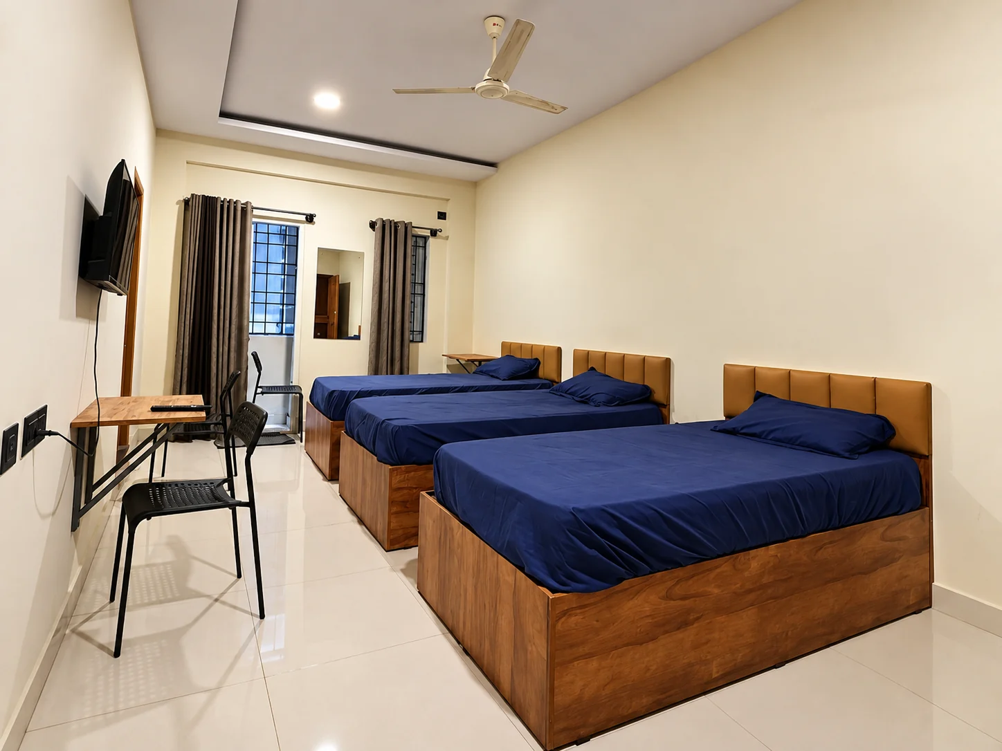 Shared room with three beds